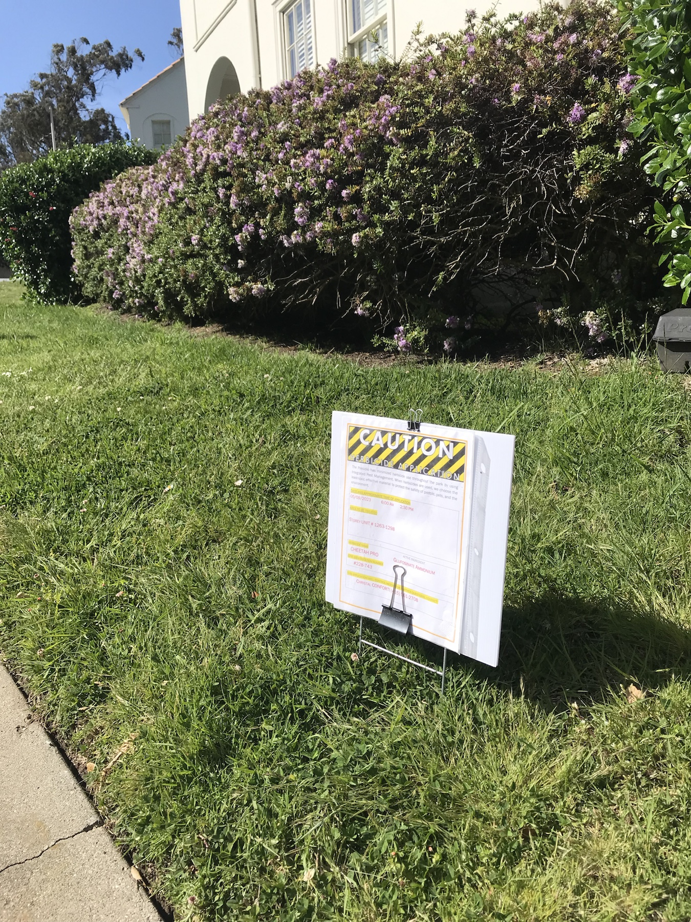 Cheetah Pro herbicide application sign posted near Storey units 1263 to 1298
