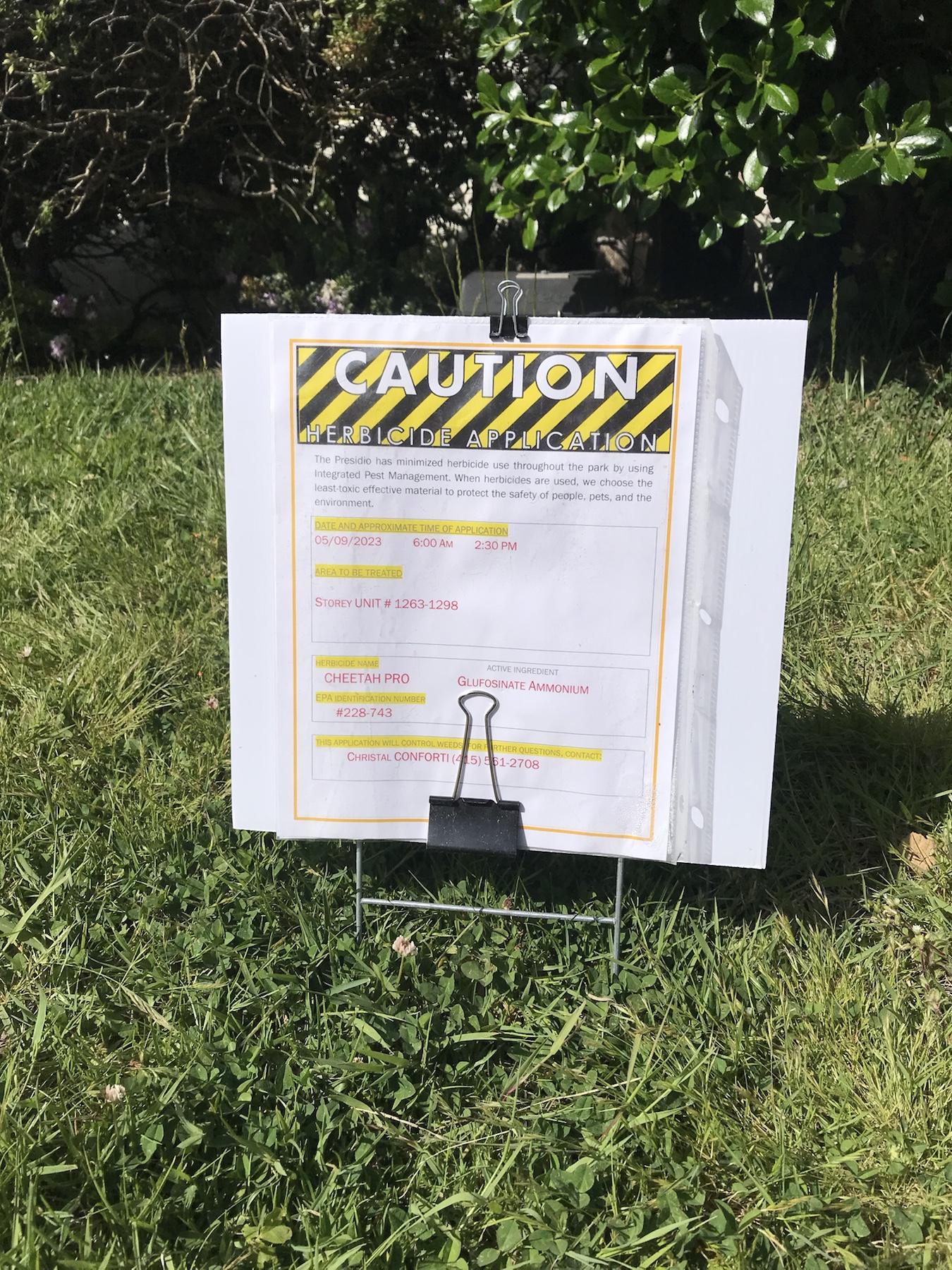 Close-up Cheetah Pro herbicide sign for Storey units 1263 to 1298