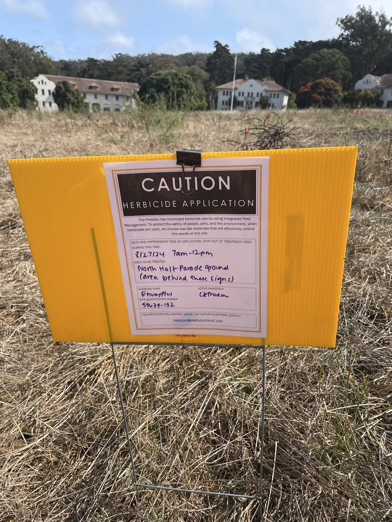 Caution herbicide application sign for Envoy Plus at the North Half Parade Ground