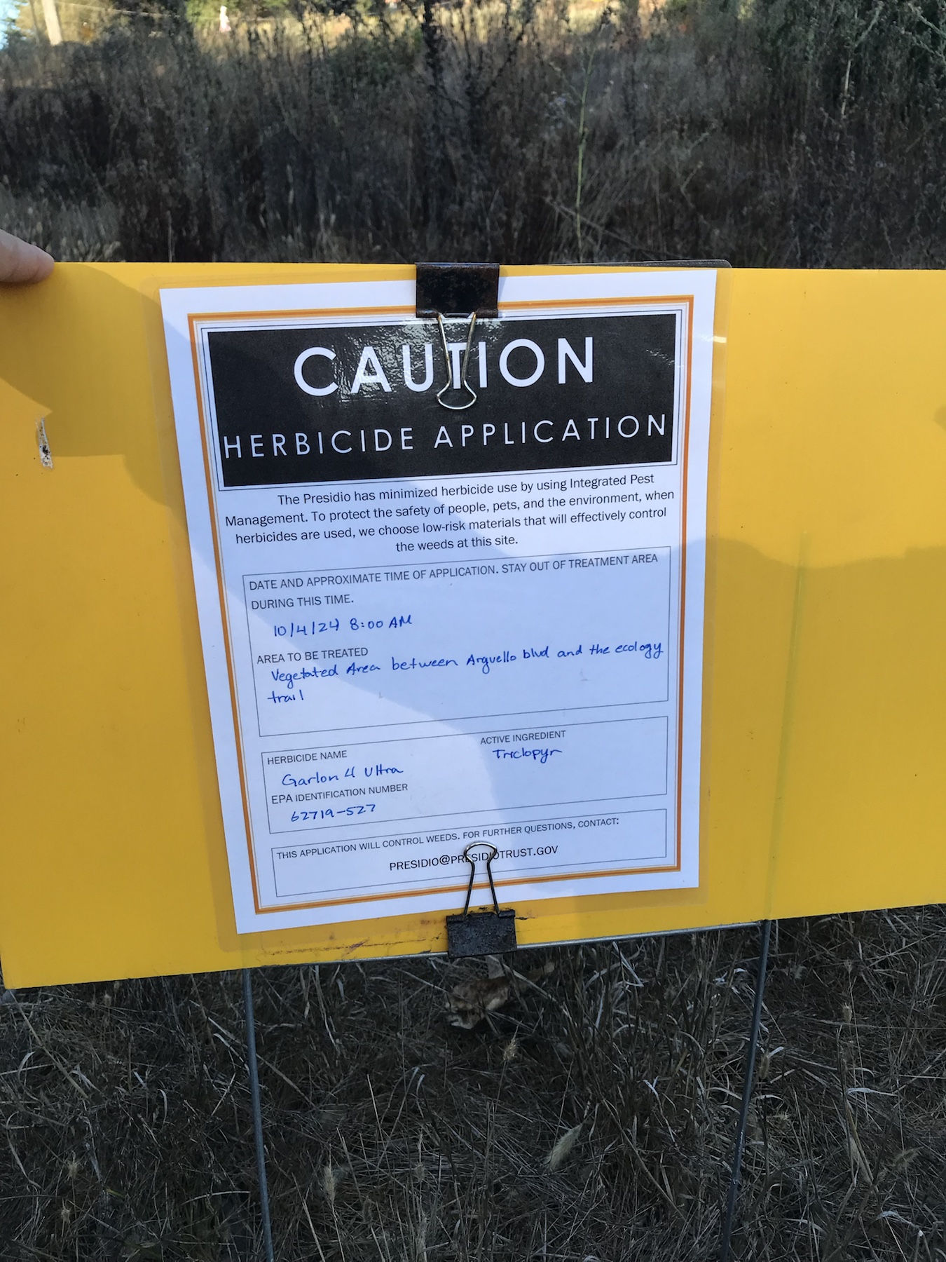 Caution herbicide application sign for Garlon 4 Ultra near Arguello Blvd and the Ecology Trail