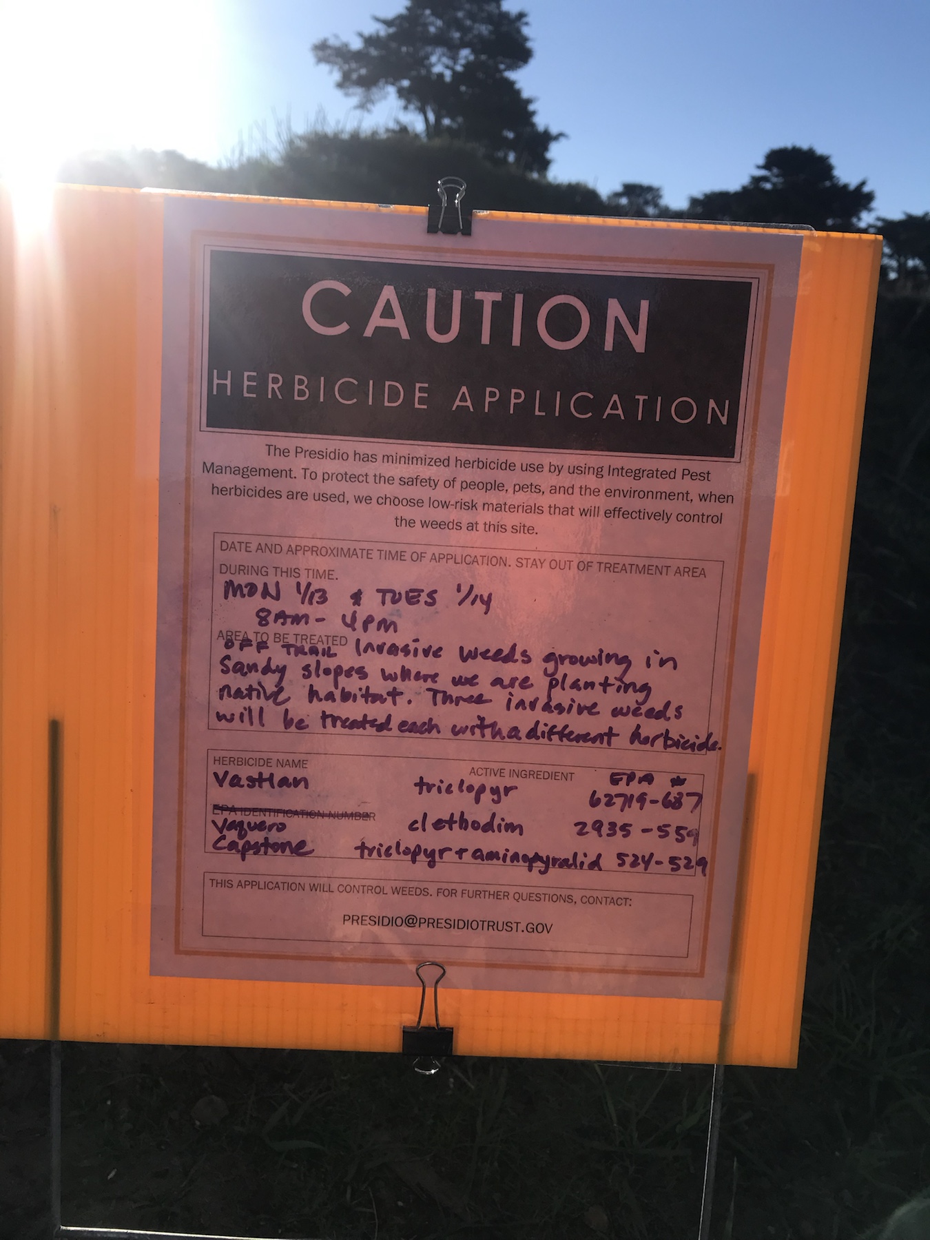 Caution herbicide application sign listing Vastlan, Vaquero, and Capstone in the Presidio