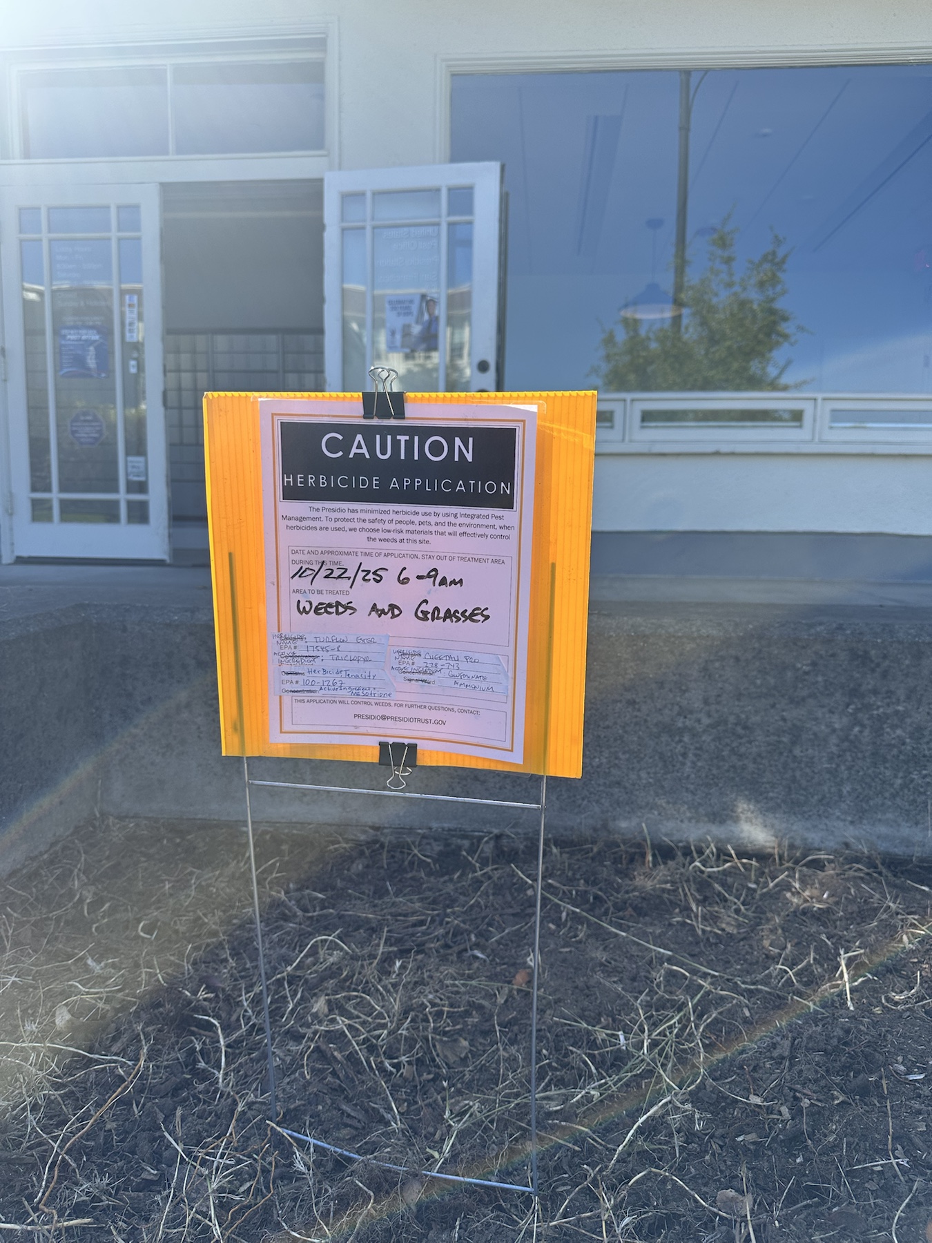 Additional context image of herbicide application sign at USPS 558-B